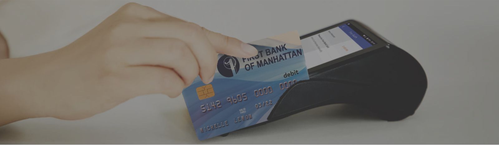FBM debit card being swiped